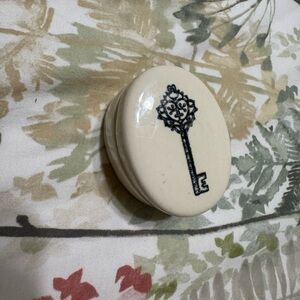 Cream Decorative Oval Trinket Box with Key Design
